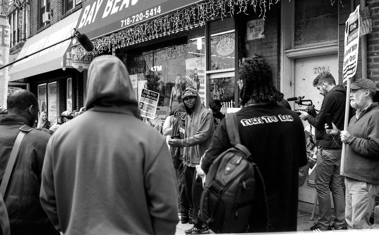 Krull magazine. Copwatch. Men with cameras. Black and white photo