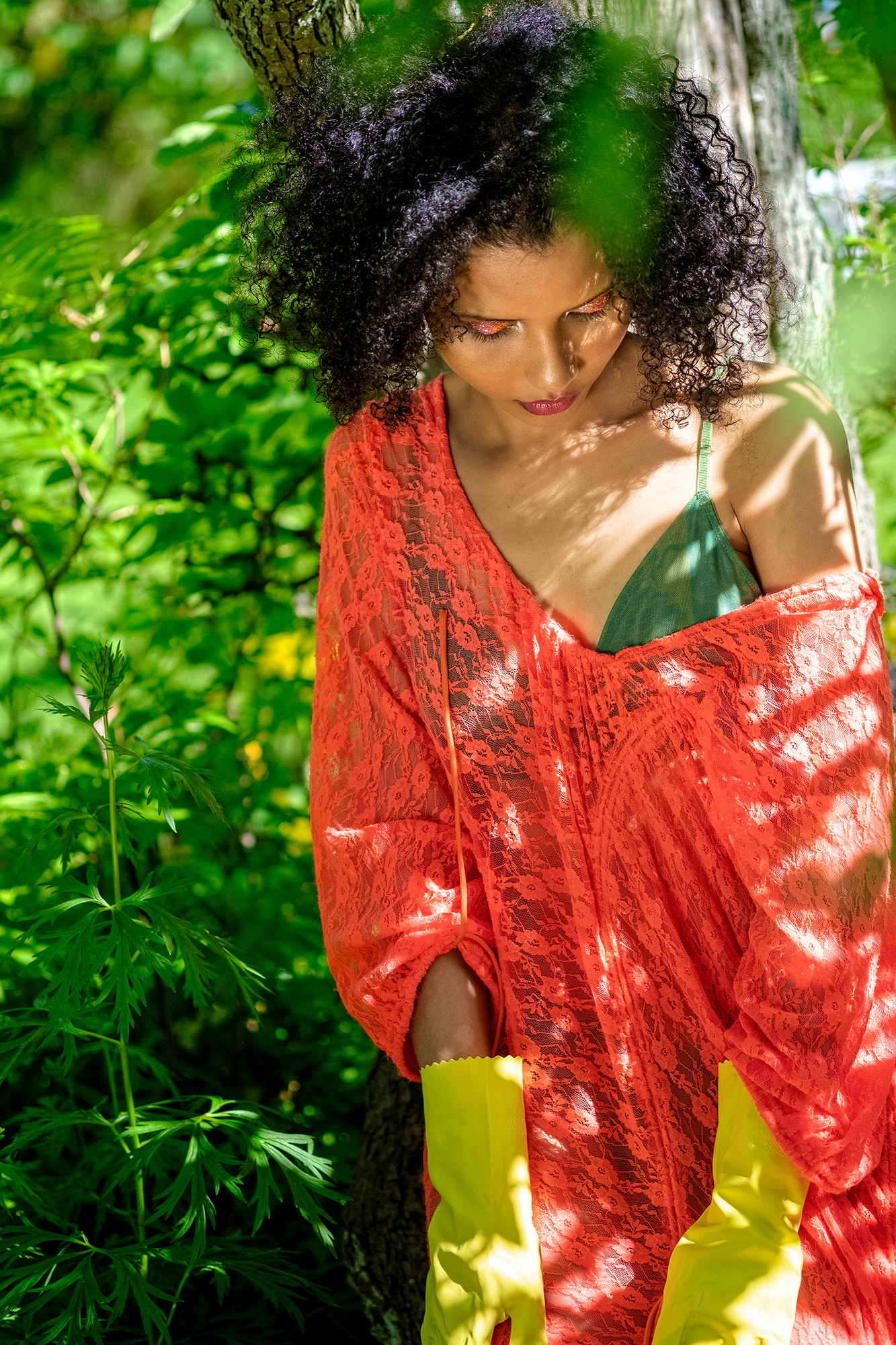 Krull magazine, Gardening Party fashion story, model wearing green bikini and orange lace dress
