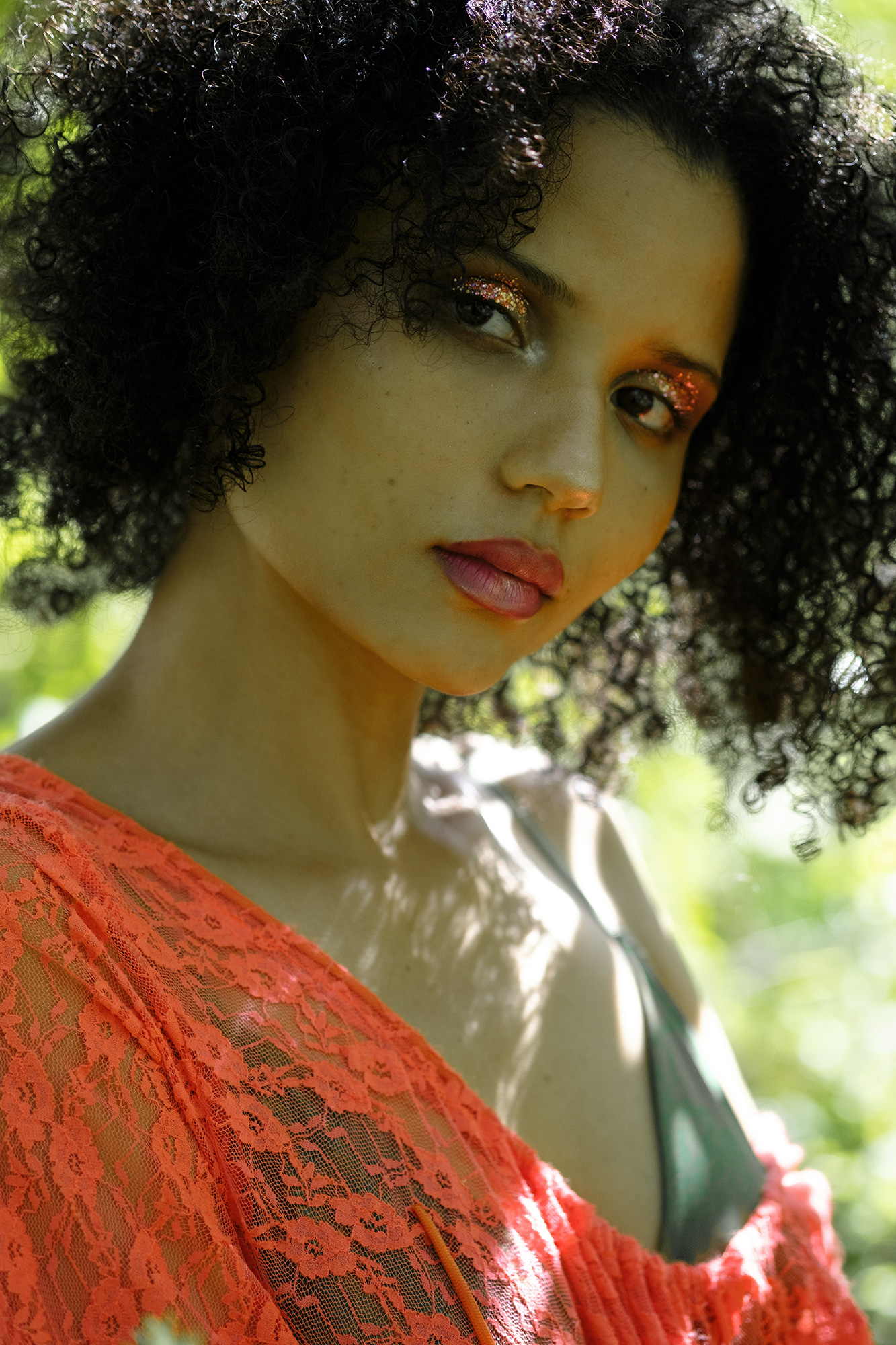 Krull magazine, Gardening Party fashion story, model wearing green bikini and orange lace dress
