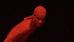 Dancer, choreographer Harald Beharie in red light