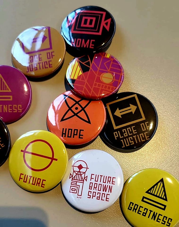 FutureBrownSpace pins with words and symbols including Hope, Future, Home and Place of Justice.